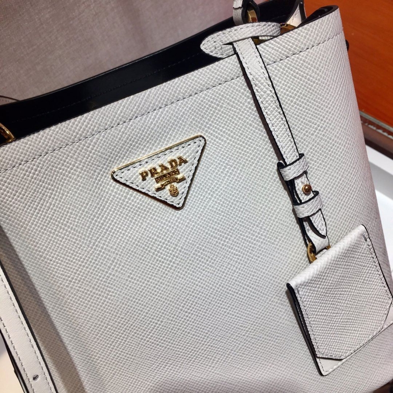 Pra*a top handle bags